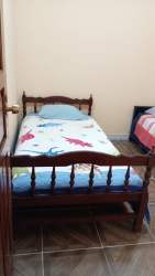 Bright bedroom with double bed, ceiling fan, tiled floors for rent Las Tablas Panama