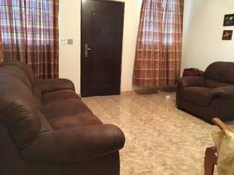 Living room with sofa set and tile floors in country house Coclé Panama