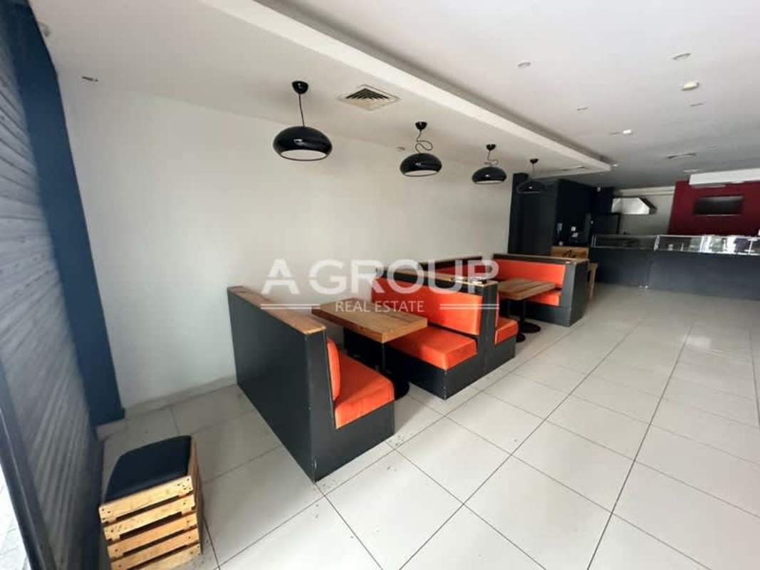 Industrial style commercial kitchen with stainless steel appliances and sinks in Plaza New York Panama