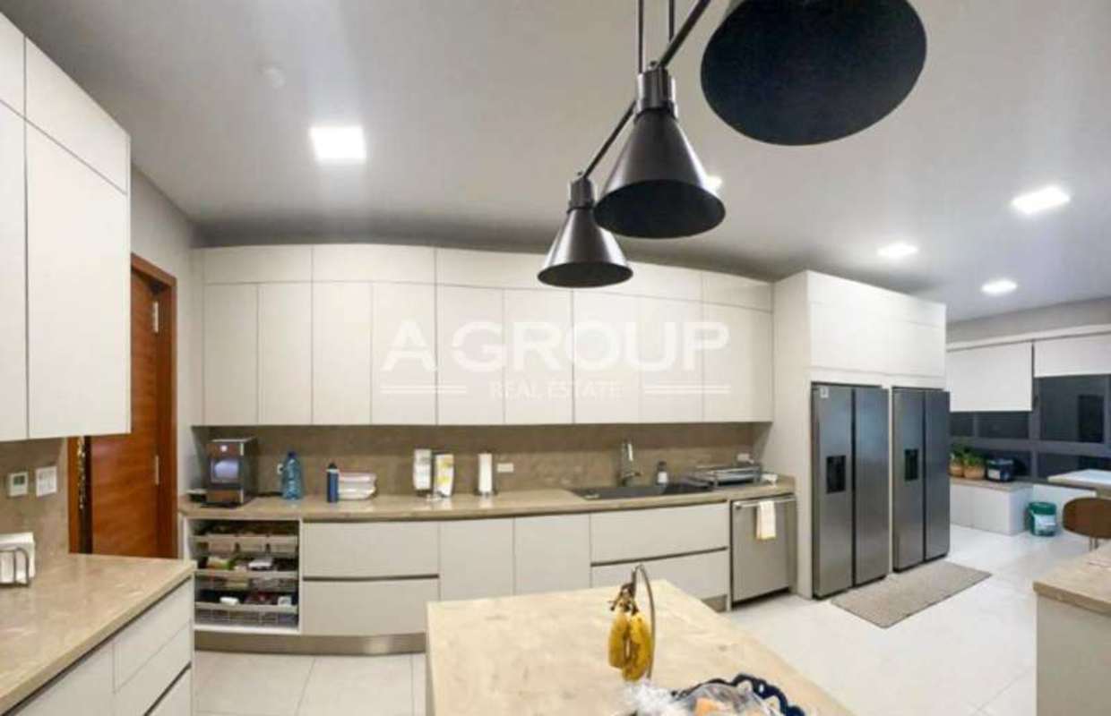 Spacious modern kitchen with Italian cabinets and island in Greenhouse Santa María Panama