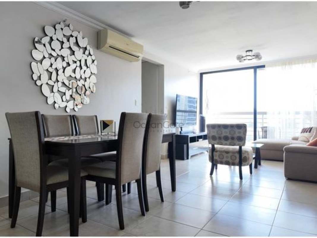 Modern kitchen with granite countertops, appliances and breakfast bar in PH Country Club Condado del Rey Panama