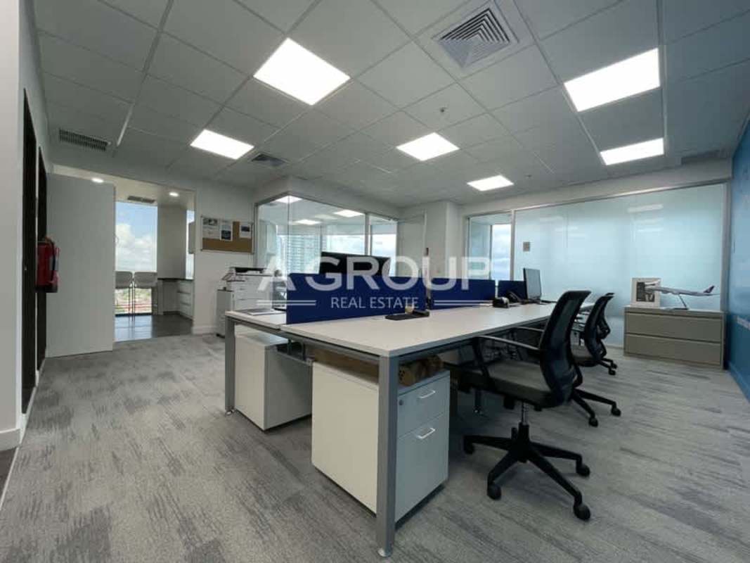 Open plan office area with glass partitions in Costa del Este Panama
