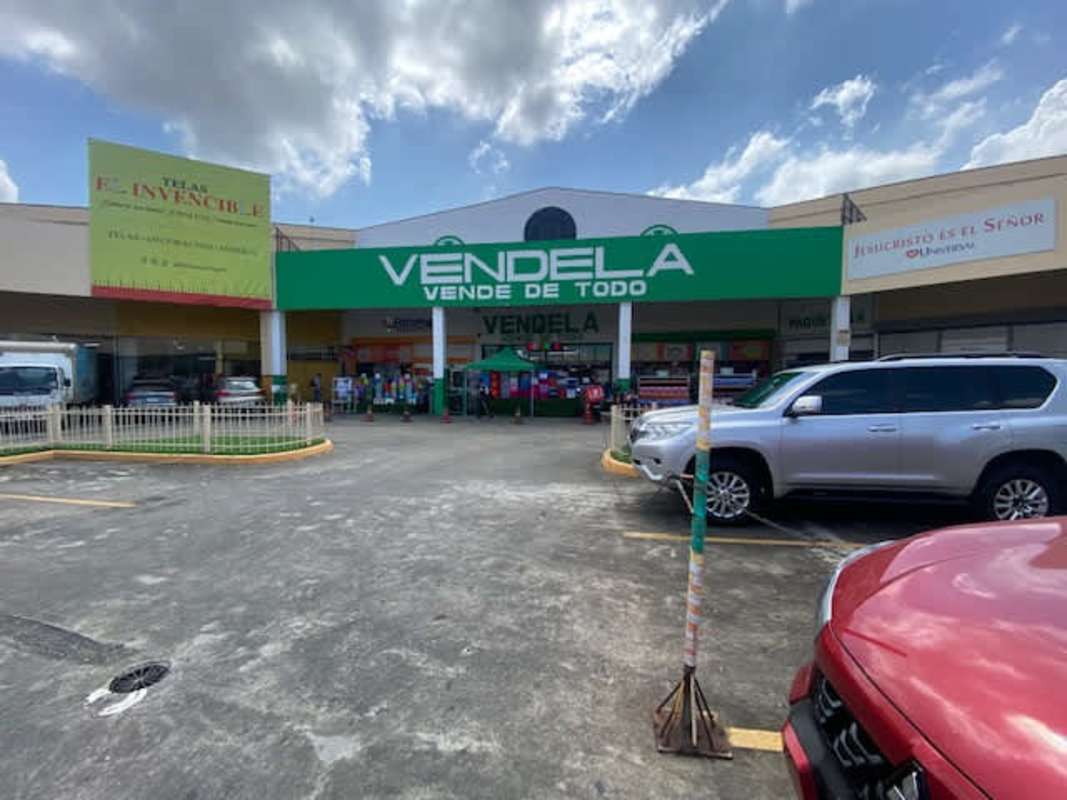 Retail unit Vendela storefront shopping plaza exterior Panama City near metro hub