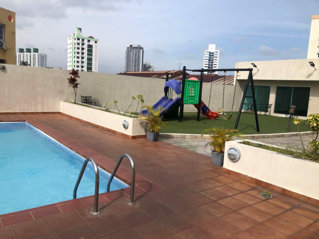 Outdoor swimming pool with kids playground on rooftop terrace PH Green Point Carrasquilla Panama