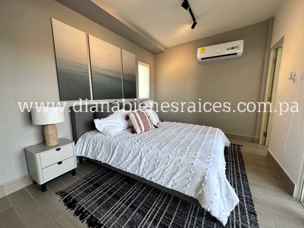 Master bedroom with ensuite, balcony sliding doors, beach property Nueva Gorgona