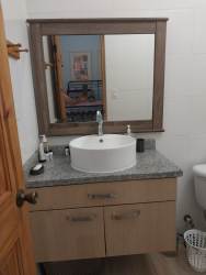 Entrance gate with security booth at Los Lirios Camino Valle de Antón San Carlos Panama