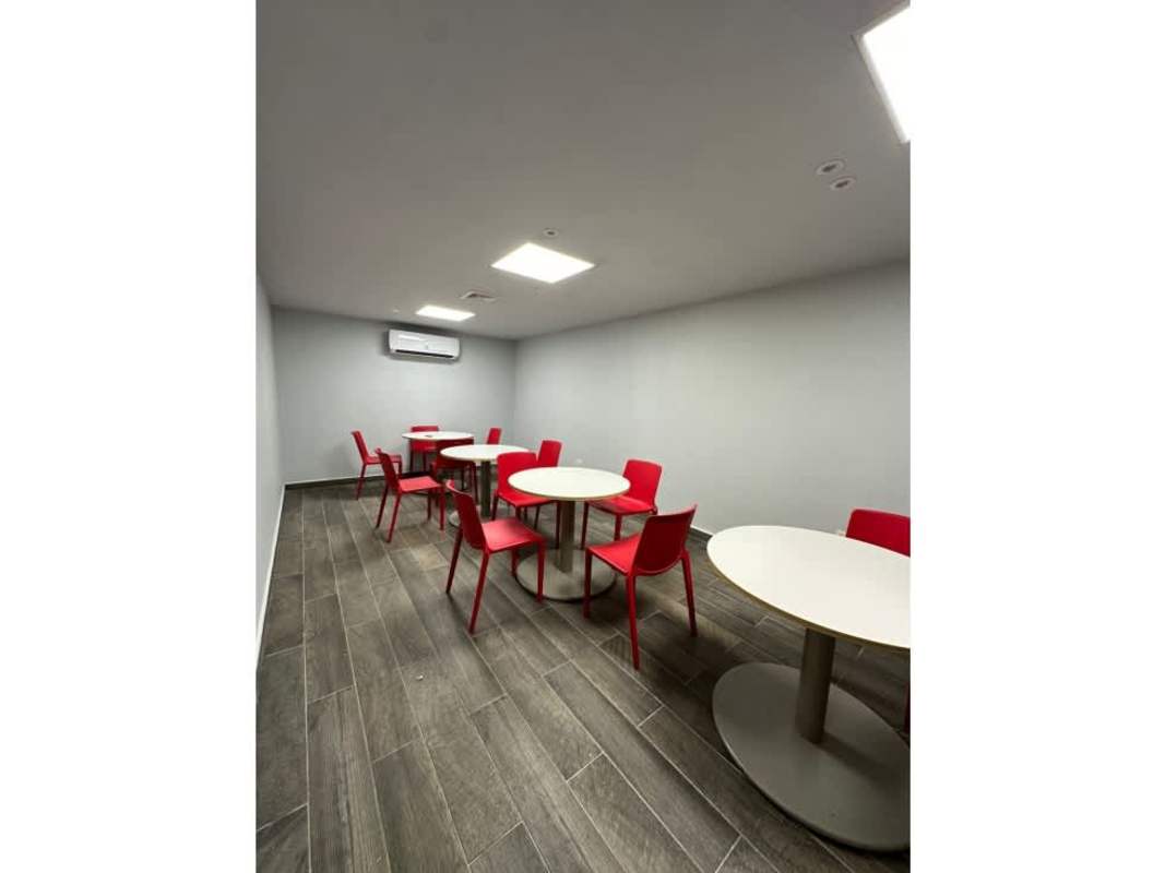 Glass enclosed meeting room with conference table in PH World Trade Center Marbella Panama