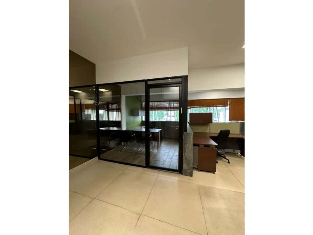 Modern kitchenette with granite counter inside office for rent at World Trade Center Panama