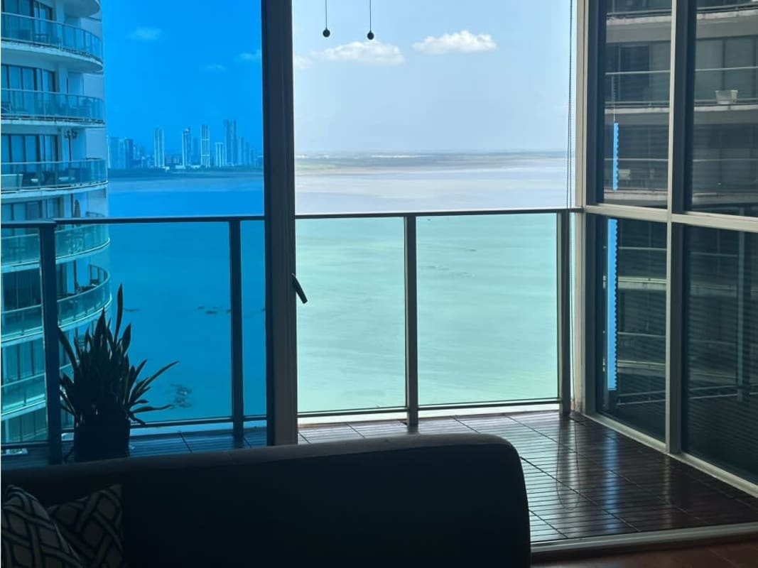 Large bedroom with ocean and skyline views at PH Oasis on the Bay Panama