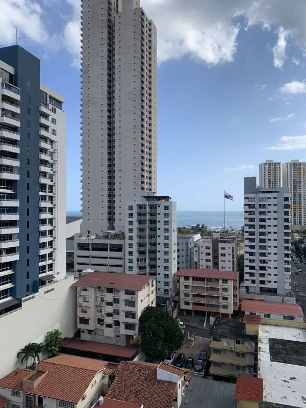 Panoramic view from balcony overlooking Panama City skyline and Pacific Ocean from San Francisco Bay apartment