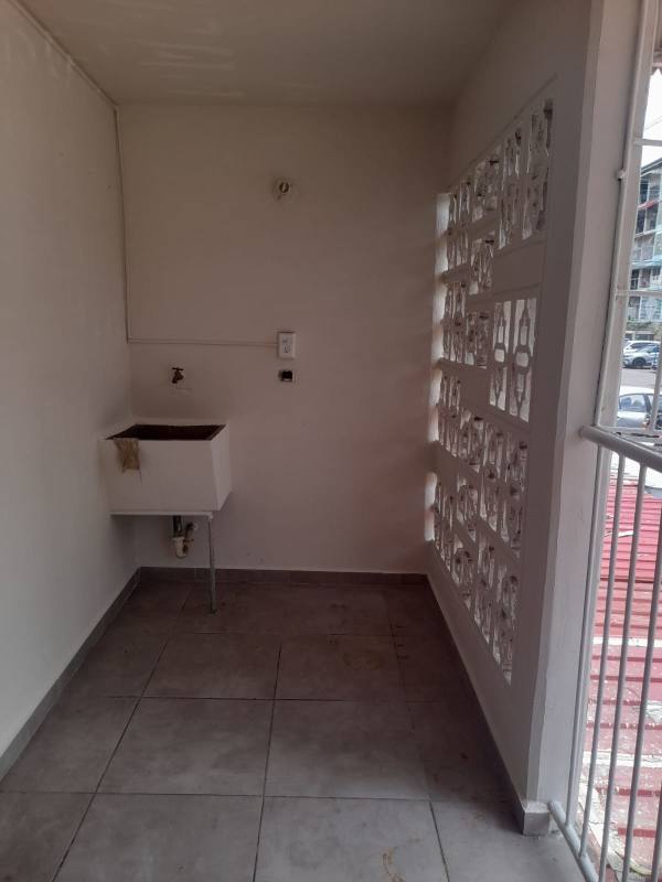 Laundry space with utility sink and tile floor Villa Gabriela Panama