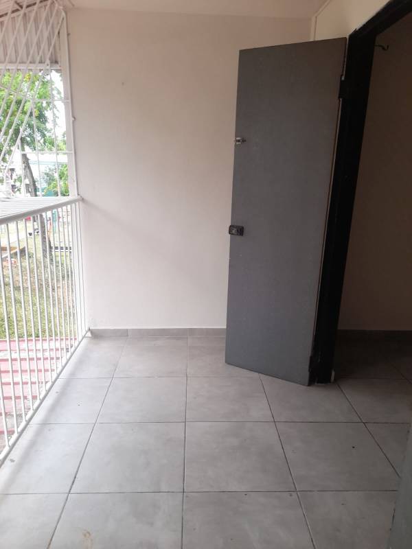 Balcony with tile floor overlooking parking Villa Gabriela Panama