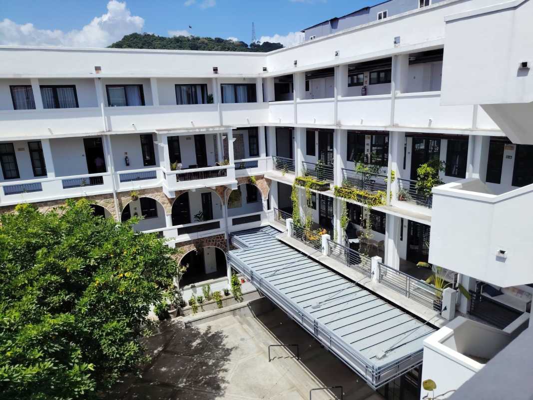 Historic colonial facade of PH La Manzana with balconies in Casco Antiguo Panama