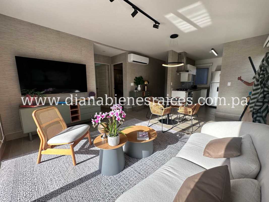 Contemporary kitchen with granite counters in lock-off beach apartment Playa Pacific Panama