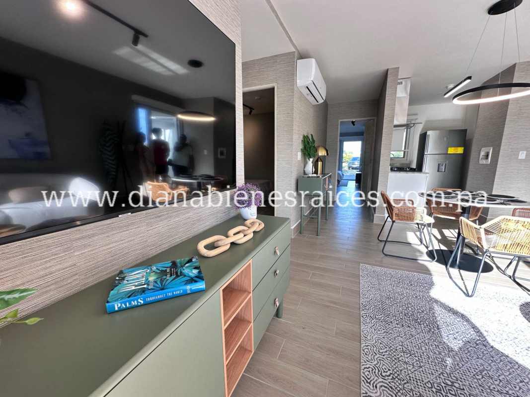 Comfortable bedroom with large windows and ocean views in Playa Pacific Panama lock off condo