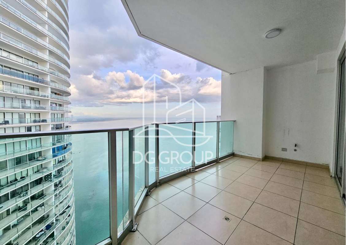 Master bedroom featuring ocean views, ensuite bathroom, tiled floor at PH Oasis on the Bay Punta Pacifica