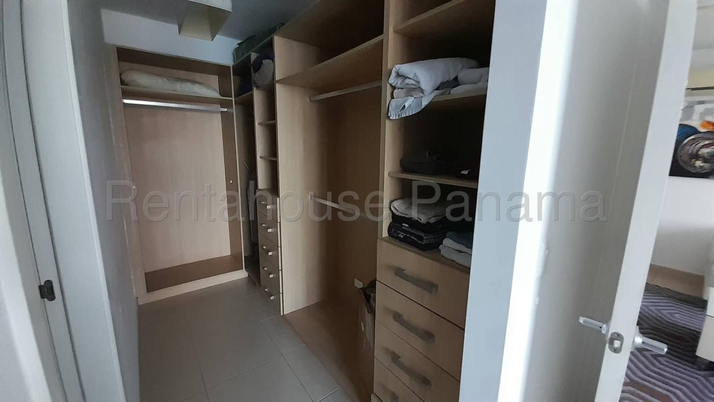 Panoramic private balcony with glass railing sea and city views at PH Miramar Avenida Balboa Panama