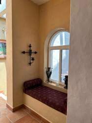 Outdoor swimming pool with jacuzzi and mountain backdrop at Finca Naso Sora Chame Panama