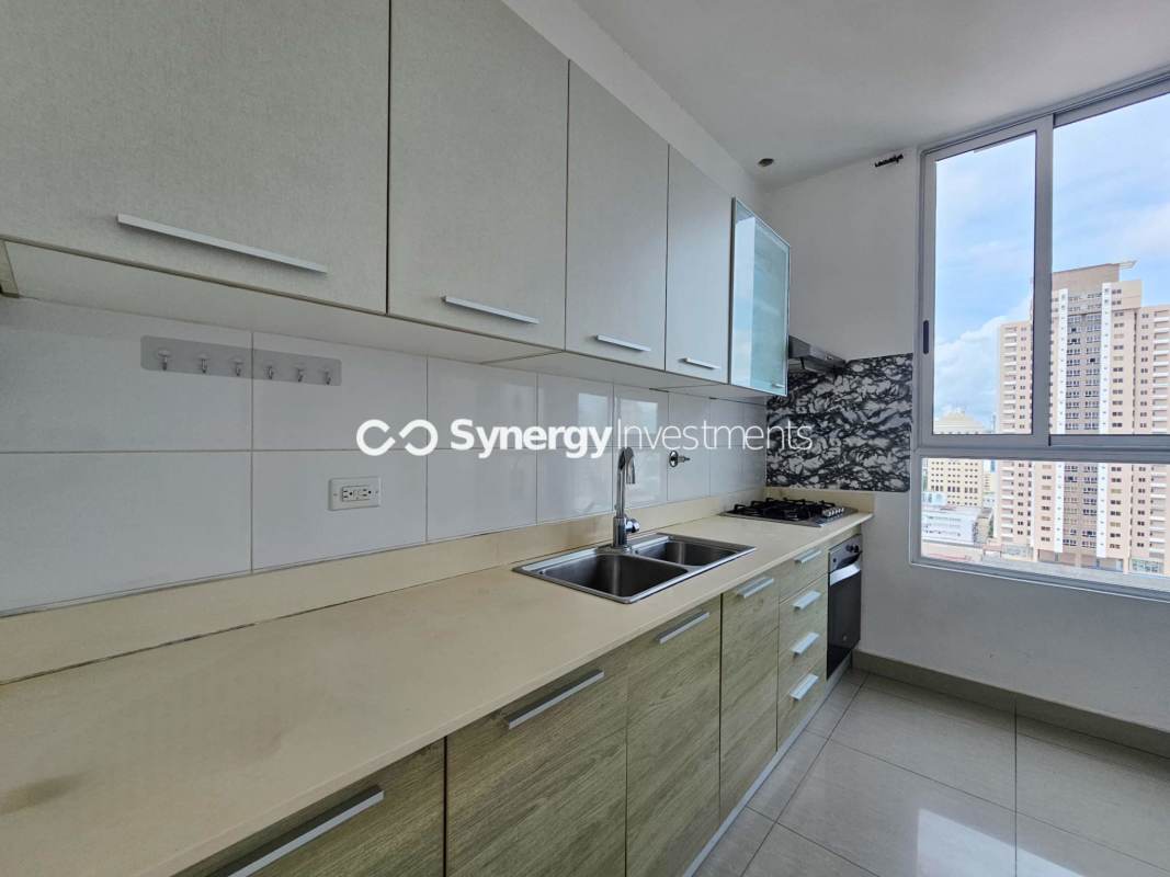 Modern bathroom with glass shower enclosure and quartz countertop El Carmen Plaza Panama