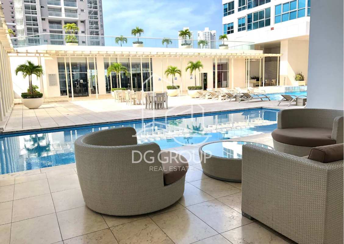 Modern open kitchen with granite countertops and built-in appliances in Costa del Este apartment for rent