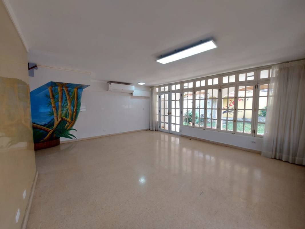 Spacious bedroom with laminate floor and large closet in Club X Betania home Panama City