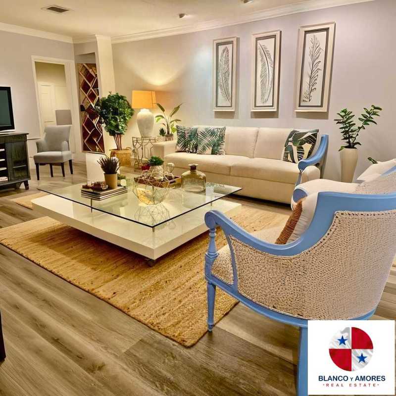 Remodeled kitchen open plan cabinetry ceramic tile floor in La Alameda house El Dorado Panama