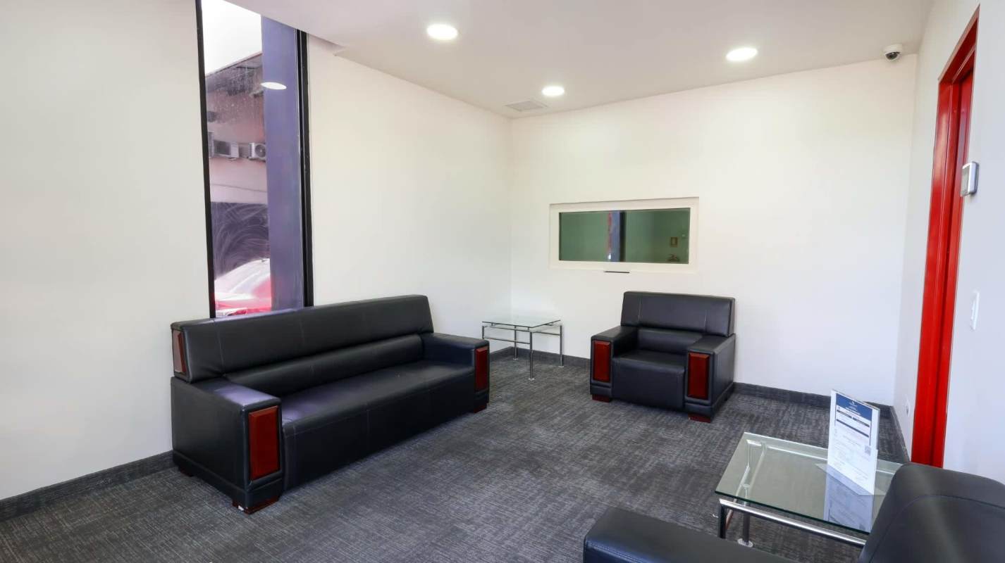 Loading dock area with concrete ramp, generator, roller doors Costa del Este Business Park Panama