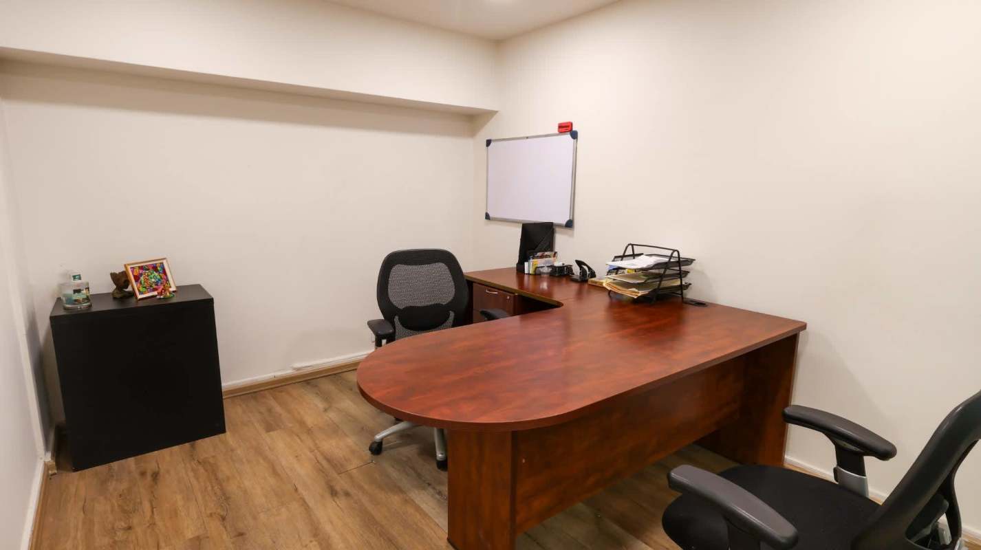 Compact glass-walled office with desk and printer Costa del Este Panama