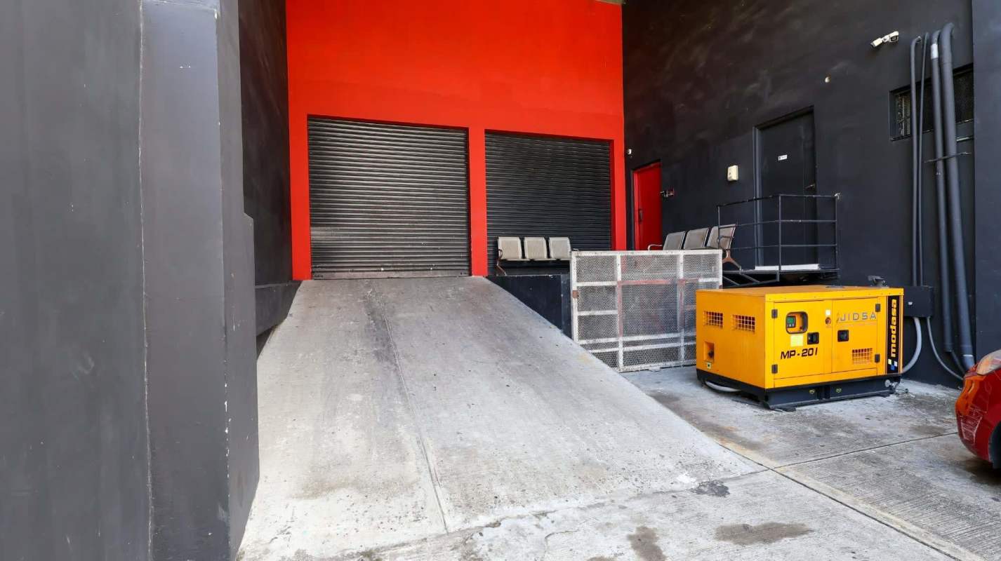 Concrete ramp with roller shutters generator security cameras Costa del Este Panama