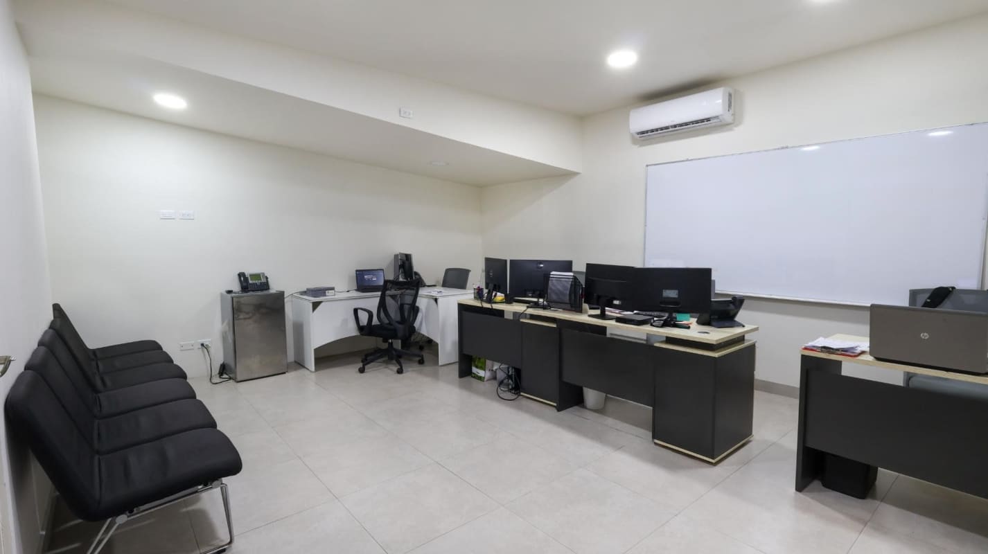 Conference or classroom style space with wood accent wall San Francisco Panama commercial building sale