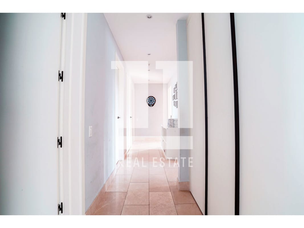 Luxurious marble bathroom with glass shower enclosure at PH Caleta Coco del Mar