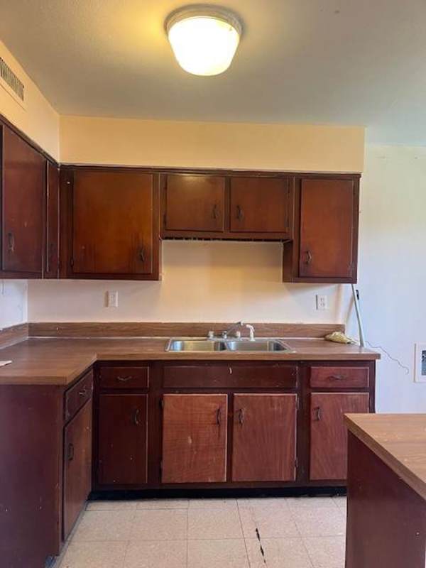 Large open interior spaces with windows and beige walls Clayton Panama