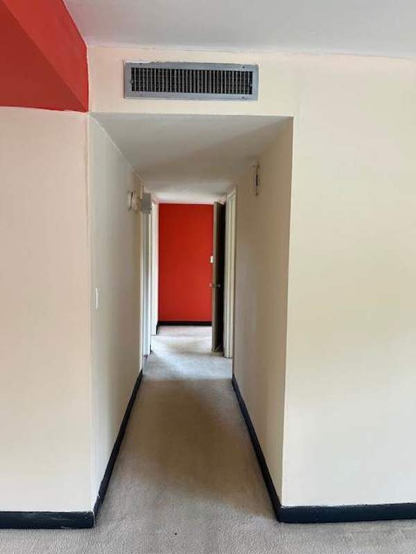 Interior hallway with ceramic tiles and beige walls Clayton Panama