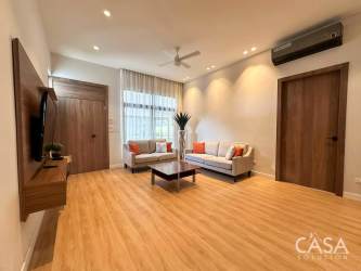 Living room with large windows and garden access house La Perla David