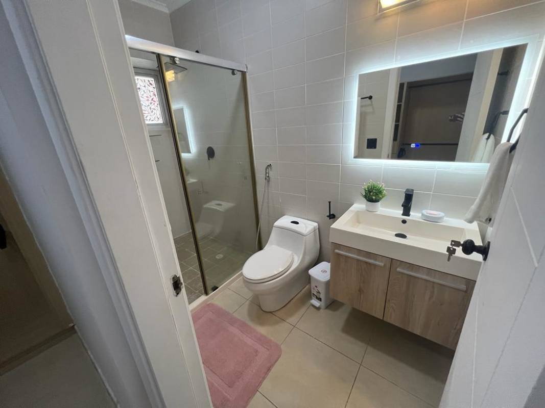 Modern bathroom with glass shower enclosure PH Waters on the Bay Panama