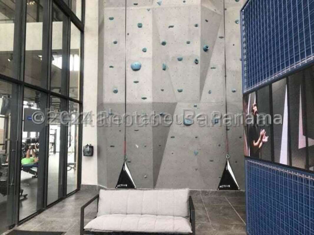 Kitchen with granite countertop and contemporary cabinetry in PH Victory Sport Coco del Mar Panama City