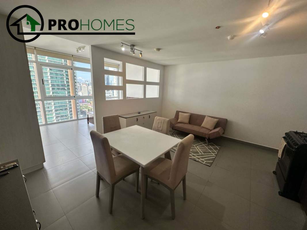 Furnished bedroom with queen bed large window ocean city view PH Colores de Bella Vista Avenida Balboa Panama