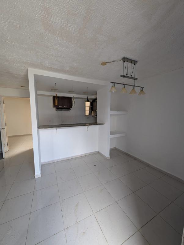 Kitchen with breakfast counter and shelves in PH Villas del Naranjal Pedregal Panama
