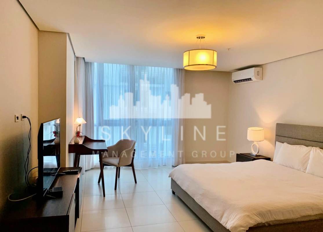 Spacious master bedroom with windows and modern finishes PH The Regent Costa del Este Panama