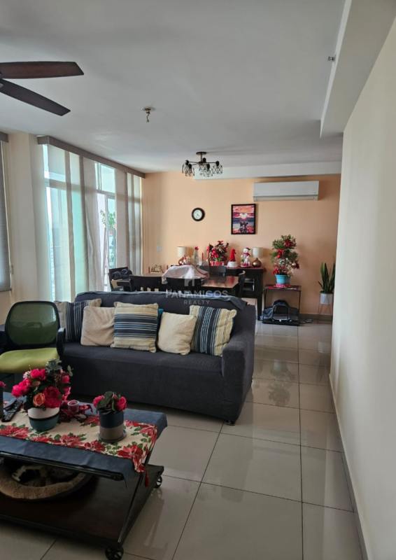 Kitchen with cabinets, tiled backsplash and window PH Torre Delta Panama City