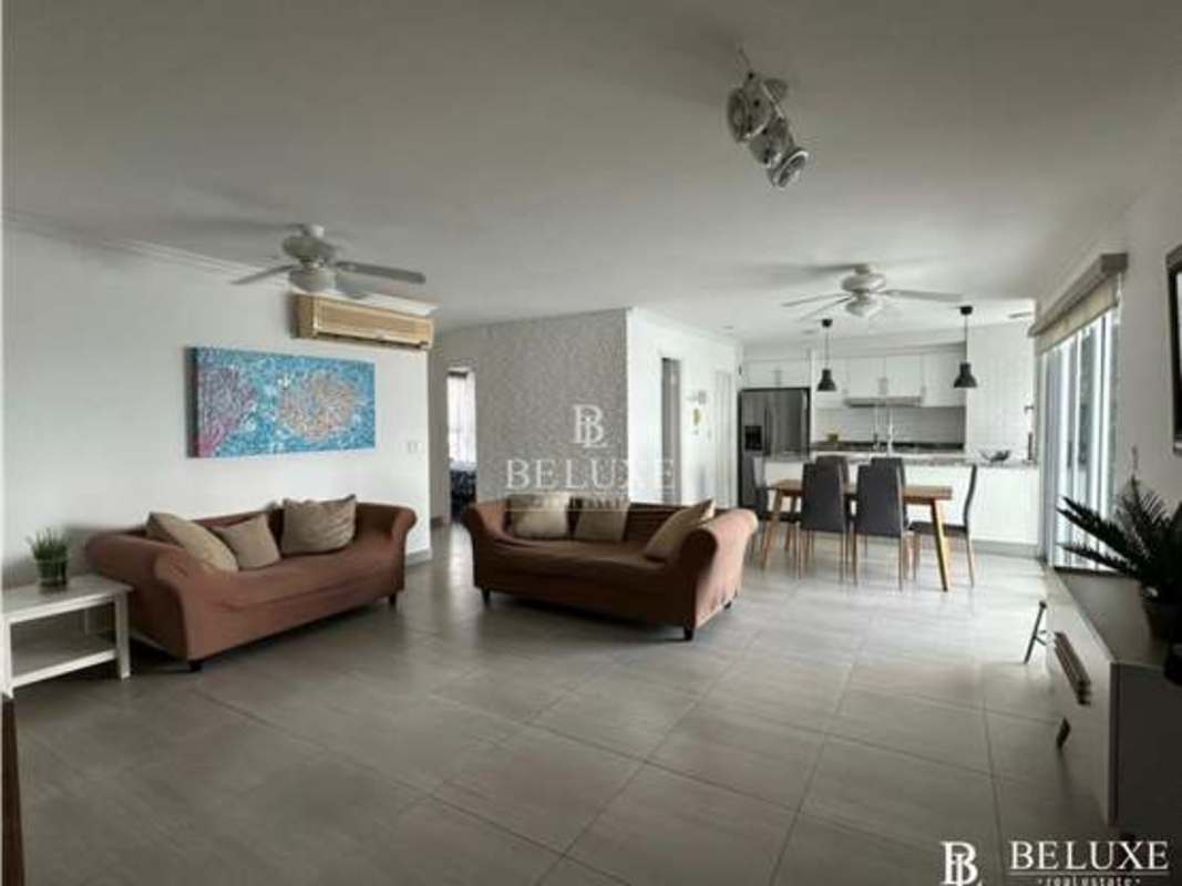 Modern kitchen with granite countertop and breakfast bar in PH Moon Tower San Francisco Panama