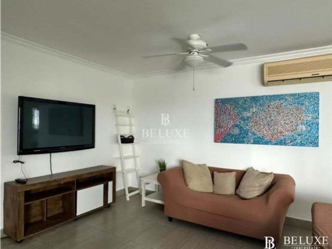 Bedroom with large windows and walk-in closet in PH Moon Tower Panama City