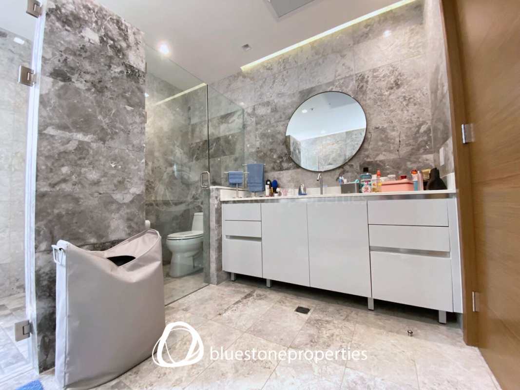 Bright family area with floor-to-ceiling windows offering golf course and ocean views in Santa Maria Panama