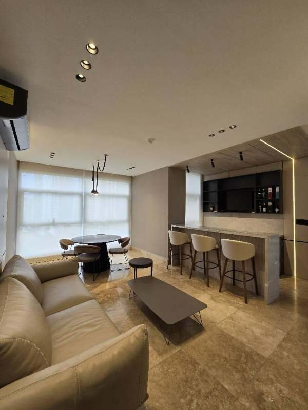 Stylish remodeled kitchen with marble counters and appliances at PH Q Tower Punta Pacifica