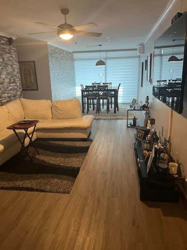 Modern gym with cardio, strength equipment and window views at PH Dos Mares Panama City