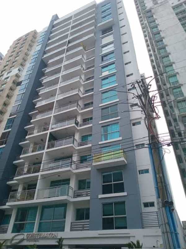 Condominium tower facade with balconies and pool deck at PH Dos Mares Panama City