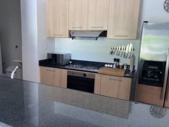 Resort infinity pool overlooking ocean palm trees Bijao Beach Resort Panama