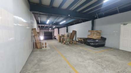 Warehouse in France Field Colón with industrial shelving storage area inside free zone Panama