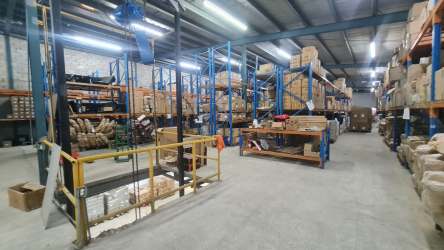 Logistics and cargo warehouse facility inside Zona Libre Colón with truck access