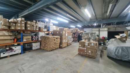 Exterior view of large two-story warehouse building at France Field Zona Libre Colon Panama